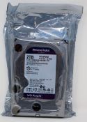 An as new Western Digital 2TB Surveillance Hard Drive (MDL: WD20PURZ-85GU6Y0) (Packaging sealed).