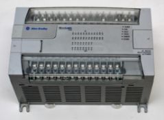 A pre-owned Allen Bradley Micrologix 1200 PLC Module (CAT: 1762-L40BWA C H) (Untested, sold as