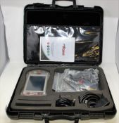 A pre-owned DimSport New Genius Vehicle ECU OBDII Remapping Tool in hard case (Various cables