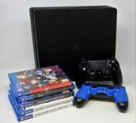 A pre-owned Sony PlayStation 4 Slim CUH-2116A Gaming Console in Black with one Sony wireless