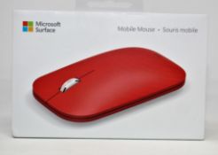 A boxed as new Microsoft Surface Mobile Mouse in Poppy Red (KGY-00052) (Box sealed).