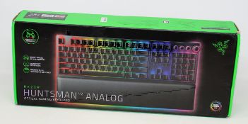 A boxed as new Razer Huntsman V2 Analog Optical Gaming Keyboard (UK English layout) (Box sealed).