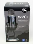 A boxed as new Blue Yeti X Professional USB Microphone in Black (Box sealed, damaged box).