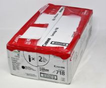 A boxed as new Canon 718 (2662B005AA) Black Toner Cartridge Twinpack (Boxes sealed, damaged