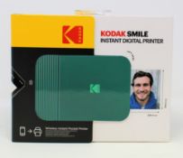 A boxed as new Kodak Smile Instant Digital Printer in Green (Box sealed).
