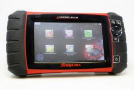 A pre-owned Snap On Tools EEMS328 Modis Ultra Diagnostic Scanner (Powers on, not tested further) (