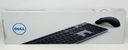 A boxed as new Dell Premier Wireless Keyboard and Mouse (P/N: 0NJWTK VPN:KM717-GY-UK) (Box opened,