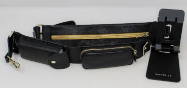 An as new Bandolier Billie Crossbody Utility Strap in Black/Gold (Strap only, phone case not