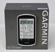 A boxed as new Garmin Edge 1030 Smart GPS Bike Computer Bundle (P/N: 010-01758-11) (Box sealed).