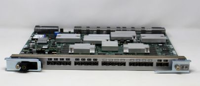 A pre-owned Brocade FR4 18i 18-Port 4Gb Fibre Channel Switch Blade (60-0000659-15) (Box and