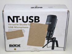 A boxed as new Rode NT-USB USB Condenser Microphone with stand and pop shield (Box opened, damaged