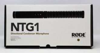 A boxed as new Rode NTG1 Directional Condenser Microphone (Box opened, some damage to box).
