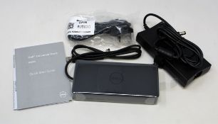 A boxed as new Dell D6000 Universal Dock (Box opened, some damage to box).