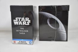 Four as new Star Wars - The Skywalker Saga 9-Movie Collections (9 Blu-ray Feature Film Discs, 9