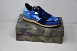 A pair of as new Valentino Garavani camouflage sneakers (EU 41).