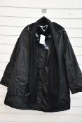 An as new Ulla Popken raincoat (EU 58/60 - RRP €150).