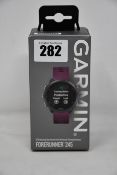 A boxed as new Garmin Forerunner 245 GPS running smartwatch in merlot.