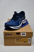 A pair of women's as new Asics Gel-Pursue 7 trainers (UK 8).