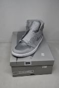 A pair of as new Nike Air Jordan 1 Hi OG (UK 9).