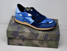 A pair of as new Valentino Garavani camouflage sneakers (EU 44).