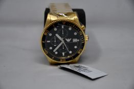 A men's as new Emporio Armani AR5857 gold chronograph watch (No box included).
