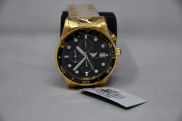 A men's as new Emporio Armani AR5857 gold chronograph watch (No box included).