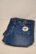 A pair of as new Donna Ida Minnie The High Top Flare jeans (W24 - RRP £215).