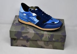 A pair of as new Valentino Garavani camouflage sneakers (EU 45).