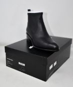 A pair of ladies boxed as new Alexander Wang Kori Stretch Nappa boots in black (EU 38).