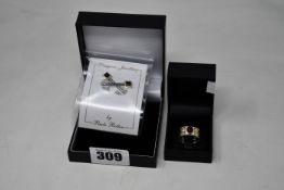 Paula Bolton jewellery to include: two Hoffman Inspirations rings (RPS9910AMB), two Bahaus