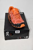 A pair of as new On Running Cloudventure waterproof walking shoes (UK 8.5).