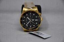 A men's as new Emporio Armani AR5857 gold chronograph watch (No box included).