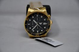 A men's as new Emporio Armani AR5857 gold chronograph watch (No box included).