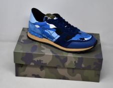 A pair of as new Valentino Garavani camouflage sneakers (EU 43).