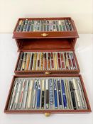 A boxed as new DeAgostini 50 Varied Fountain pens with Wooden Case, RRP £400