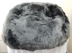 A boxed as new Natures Collection Nordic Living New Zealand Sheepskin Bean Bag 92 x 93cm, Longwool