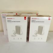 Four boxed as new Honeywell 150m Wireless Portable Door Chime Kit 4 Tunes in White. RRP £42 each