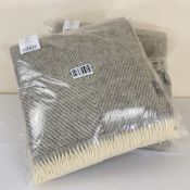 A bagged as new Urbanara Gotland Wool Blanket (220x260cm) and a bagged as new Urbanara Gotland