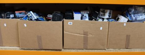 A quantity of merchandise from Star Wars to include mugs, bags, bookends and pencil cases.