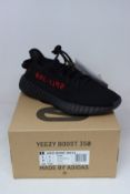 A pair of as new Adidas Yeezy Boost 350 V2 trainers (UK 5).
