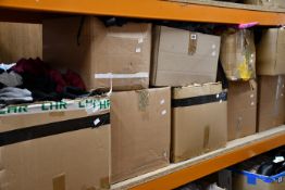 Nine boxes of assorted clothing and related items.