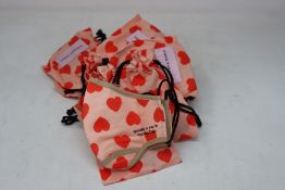 Ten as new Natasha Zinko Hearts face masks (RRP £25 each).