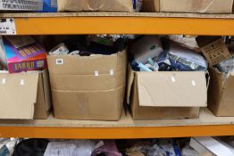 Four boxes of miscellaneous items.