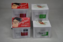 Three Cosrx one step original clear pad (3 x 70 pads) and four Cosrx one step calming pad (4 x 70