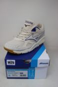 A pair of as new Mizuno Sky Medal trainers (UK 9).