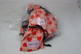 Ten as new Natasha Zinko Hearts face masks (RRP £25 each).