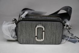 An as new Marc Jacobs Snapshot Glitter bag.