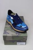 A pair of as new Valentino Garavani camouflage sneakers (EU 44).