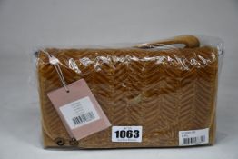 Three as new Unmade Copenhagen Janel clutch bags in bronze brown (RRP £75 each).