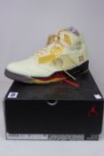 A pair of as new Nike X Off White Air Jordan 5 Retro SP 